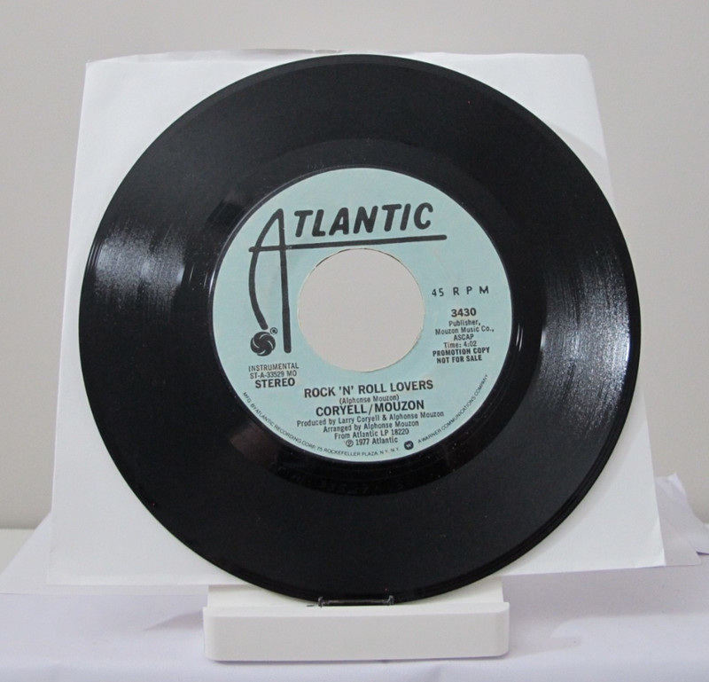45 RECORD – CORYELL/MOUZON – ROCK N ROLL LOVERS