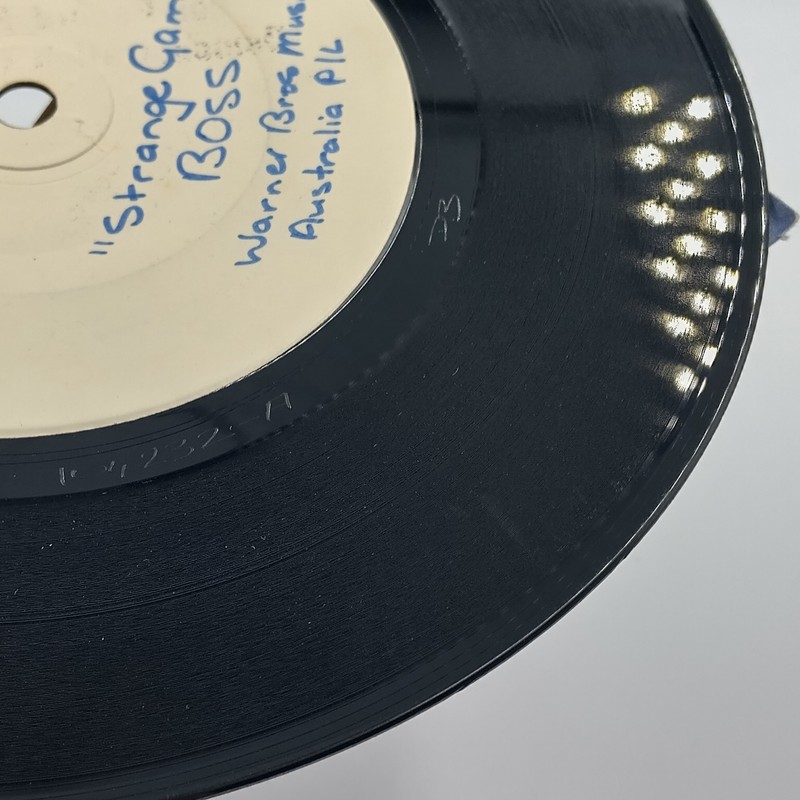 BOSS "Strange Games" Warner Bros Music Australia P/L Test Pressing 7" Vinyl gallery