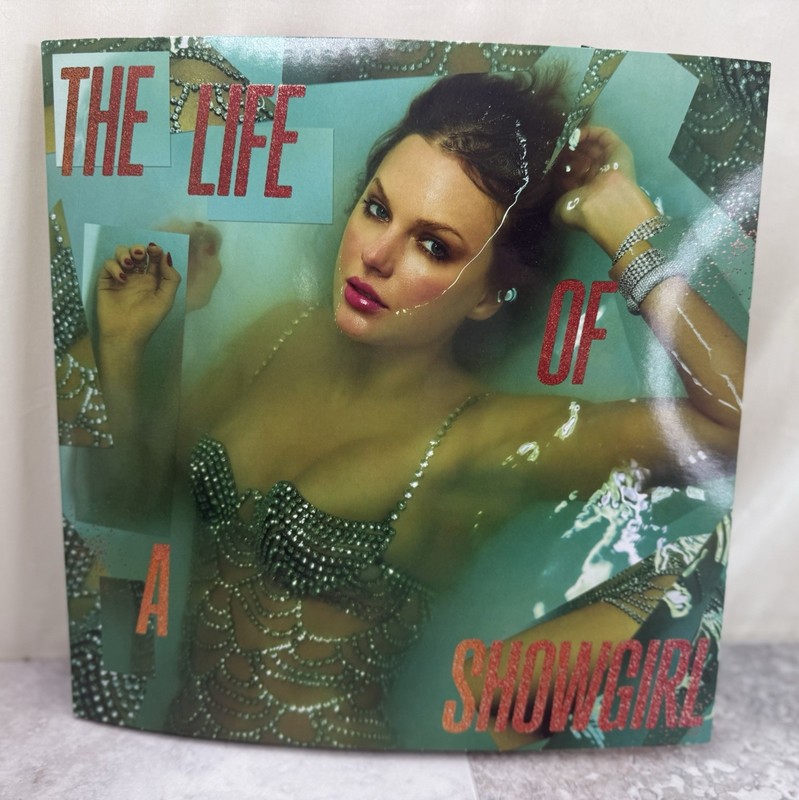 The Life of a Showgirl: Lit My Sky Up Vinyl Orange Metallic Cumin New Unwrapped