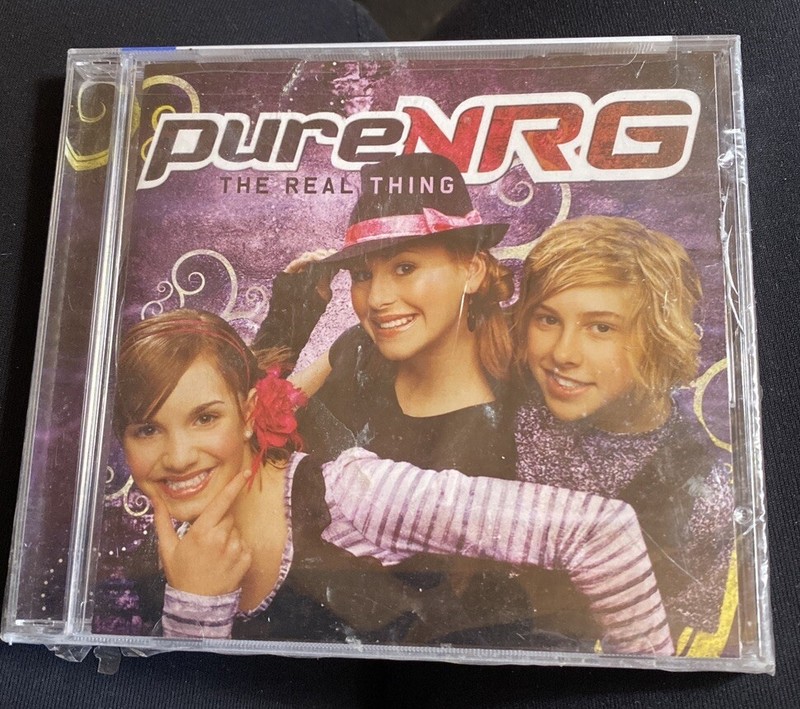 NEW Sealed! CD PureNRG: The Real Thing 13 tracks with 3 sing a long