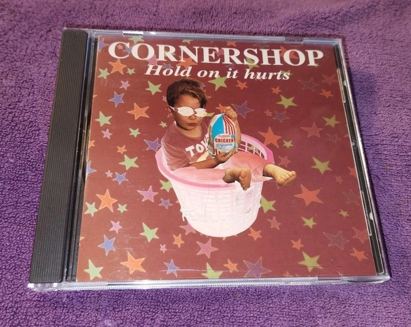 CORNERSHOP cd HOLD ON IT HURTS 14 tracks MERGE mrg074