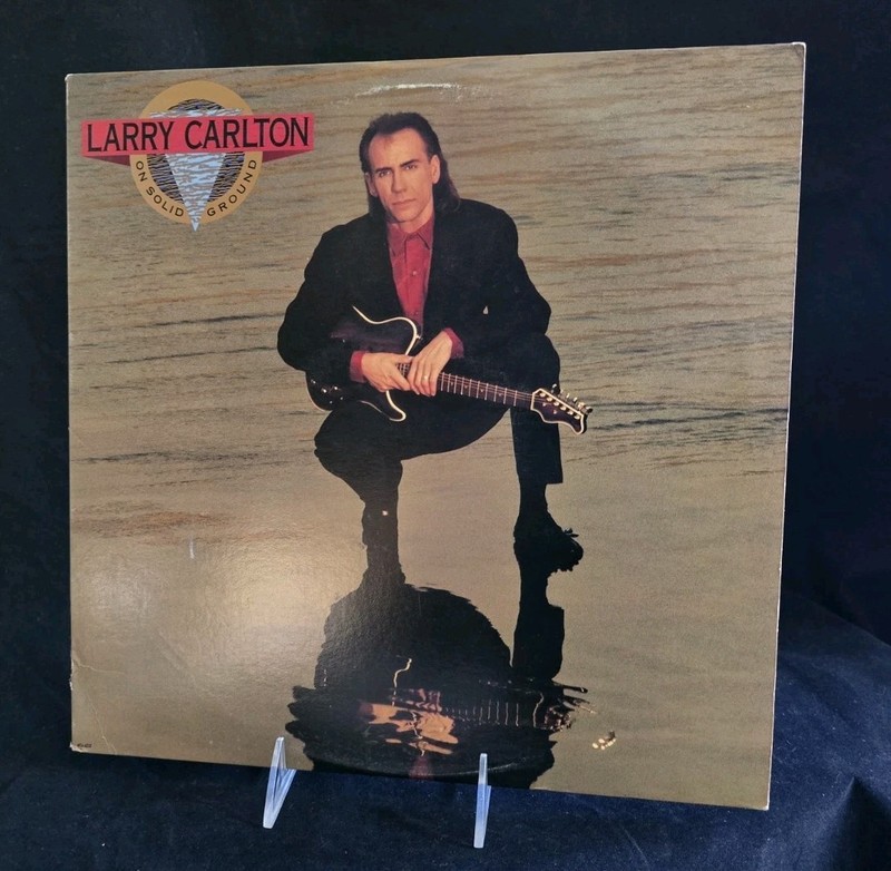 Larry Carlton – On Solid Ground (LP) 1989, MCA Records