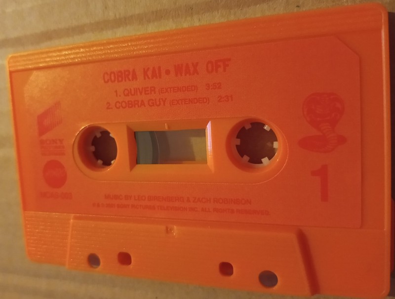 Cobra Kai: Wax On - Mondo Limited Edition Orange Cassette [Pre-Owned] gallery