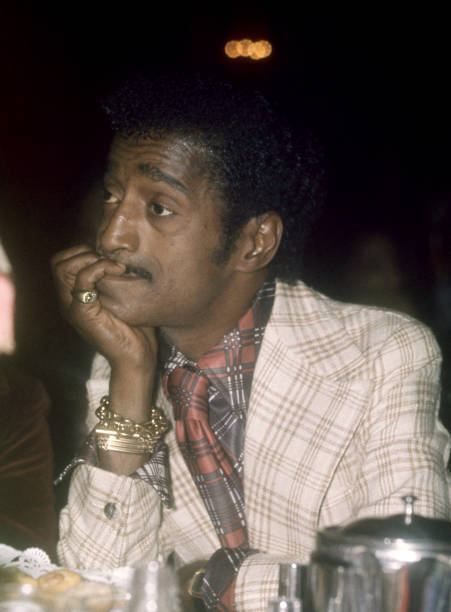 Sammy Davis Jr Sits during an unspecified event in New York New Yo- Old Photo